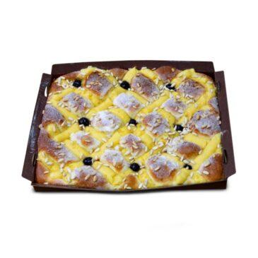 Coca de crema amb pinyons